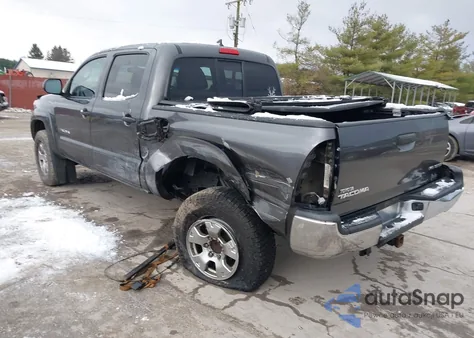 2014 Toyota Tacoma Base V6 z USA, uszkodzony, nr VIN 3TMLU4EN7EM146476